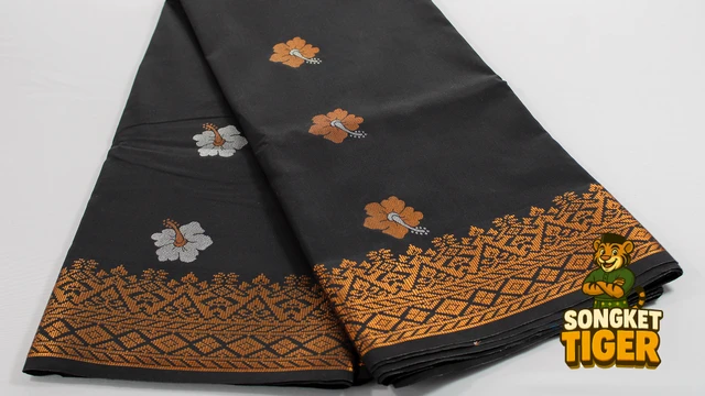 Kain Pasang Songket Tenun fabric design 8 by SongketTiger, folded to show its woven gold and silver motif border.