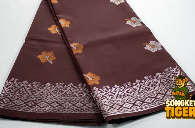 Handwoven songket fabric showing detailed thread work