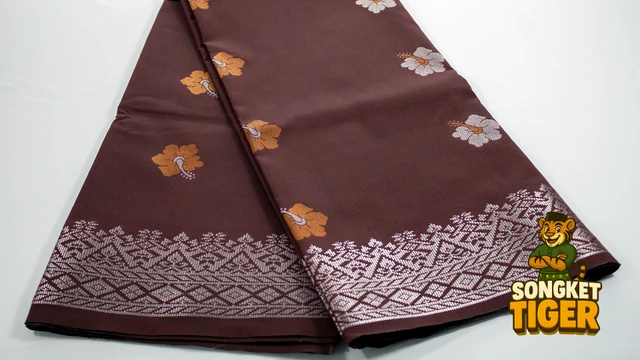 Kain Pasang Songket Tenun fabric design 9 by SongketTiger, folded to show its woven gold and silver motif border.