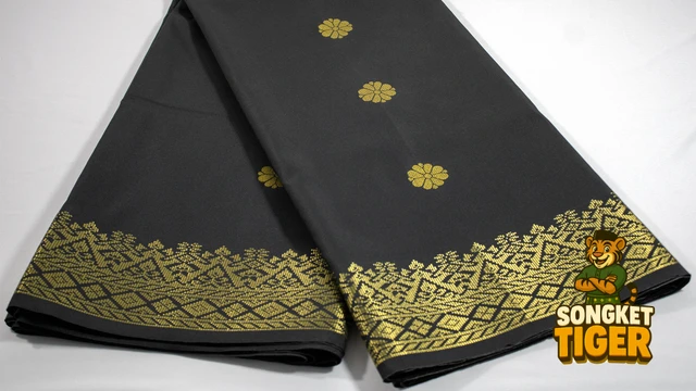 Kain Pasang Songket Tenun fabric design 1 by SongketTiger, folded to show its woven gold and silver motif border.