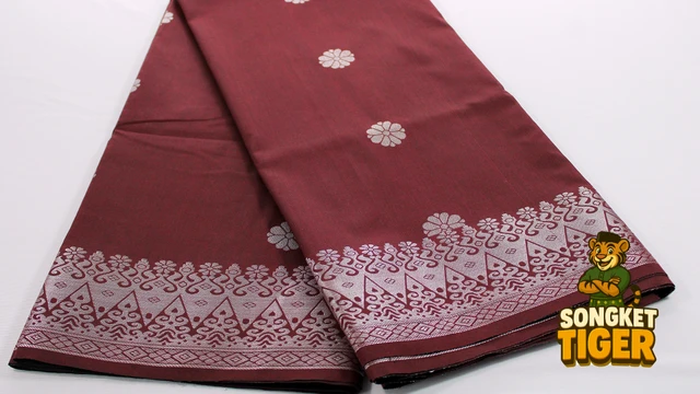Kain Pasang Songket Tenun fabric design 10 by SongketTiger, folded to show its woven gold and silver motif border.