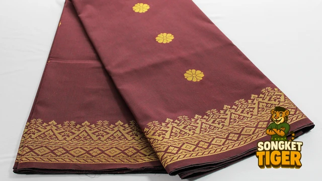 Kain Pasang Songket Tenun fabric design 2 by SongketTiger, folded to show its woven gold and silver motif border.
