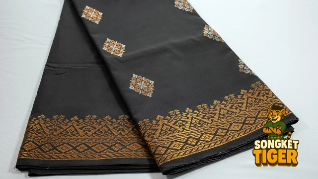 Kain Pasang Songket Tenun fabric design 7 by SongketTiger, folded to show its woven gold and silver motif border.