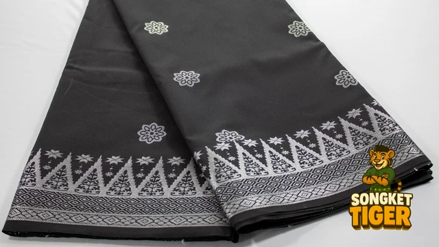 Kain Pasang Songket Tenun fabric design 13 by SongketTiger, folded to show its woven gold and silver motif border.