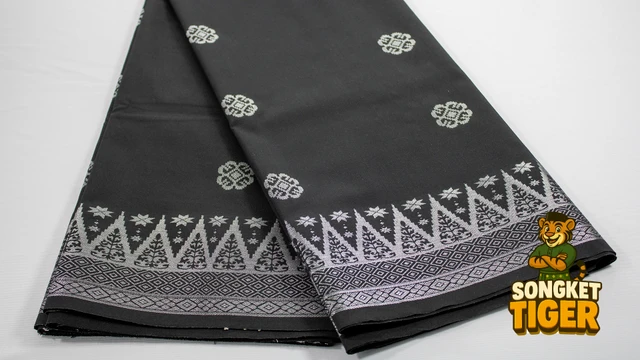 Kain Pasang Songket Tenun fabric design 14 by SongketTiger, folded to show its woven gold and silver motif border.