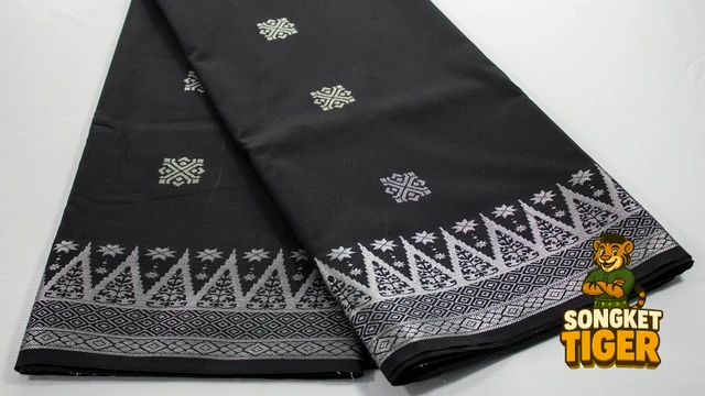 Kain Pasang Songket Tenun fabric design 16 by SongketTiger, folded to show its woven gold and silver motif border.