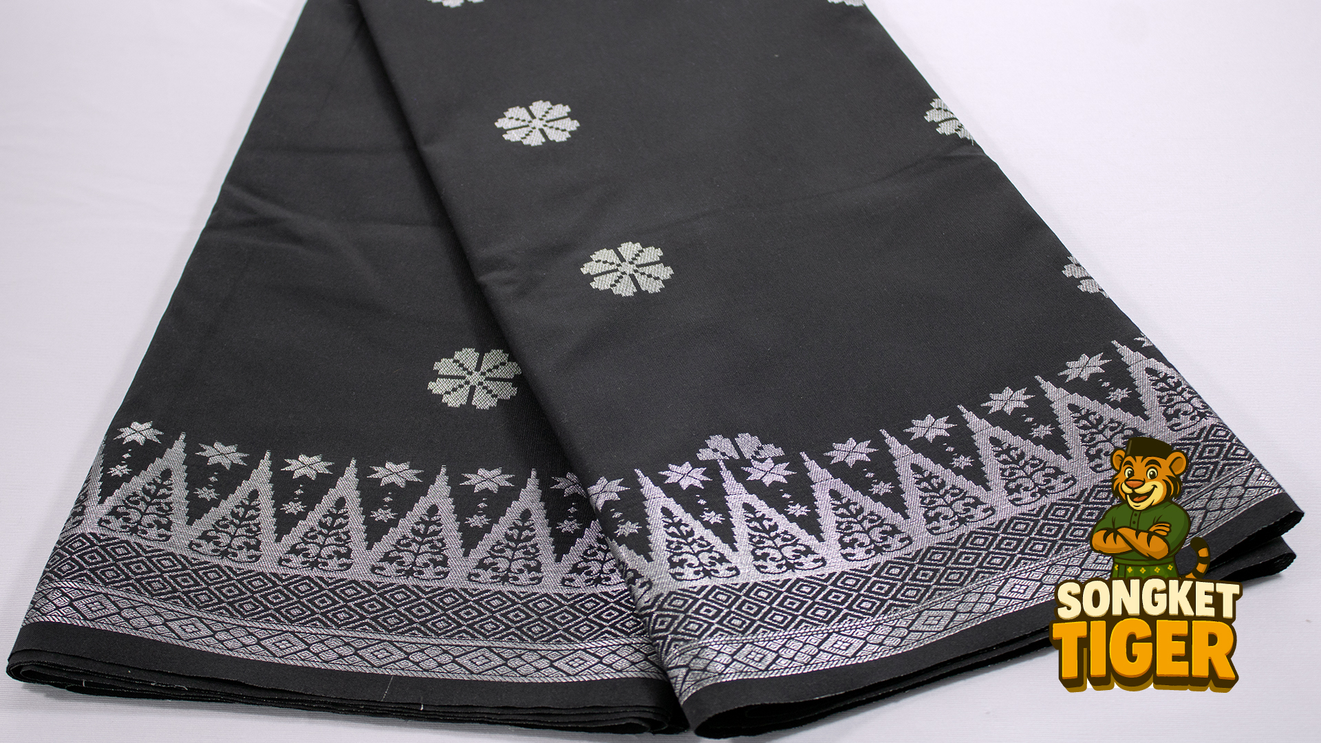 Maroon songket with repeating tree-of-life border design