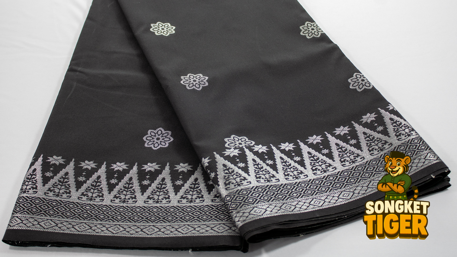 Songket with geometric diamond pattern in gold on navy