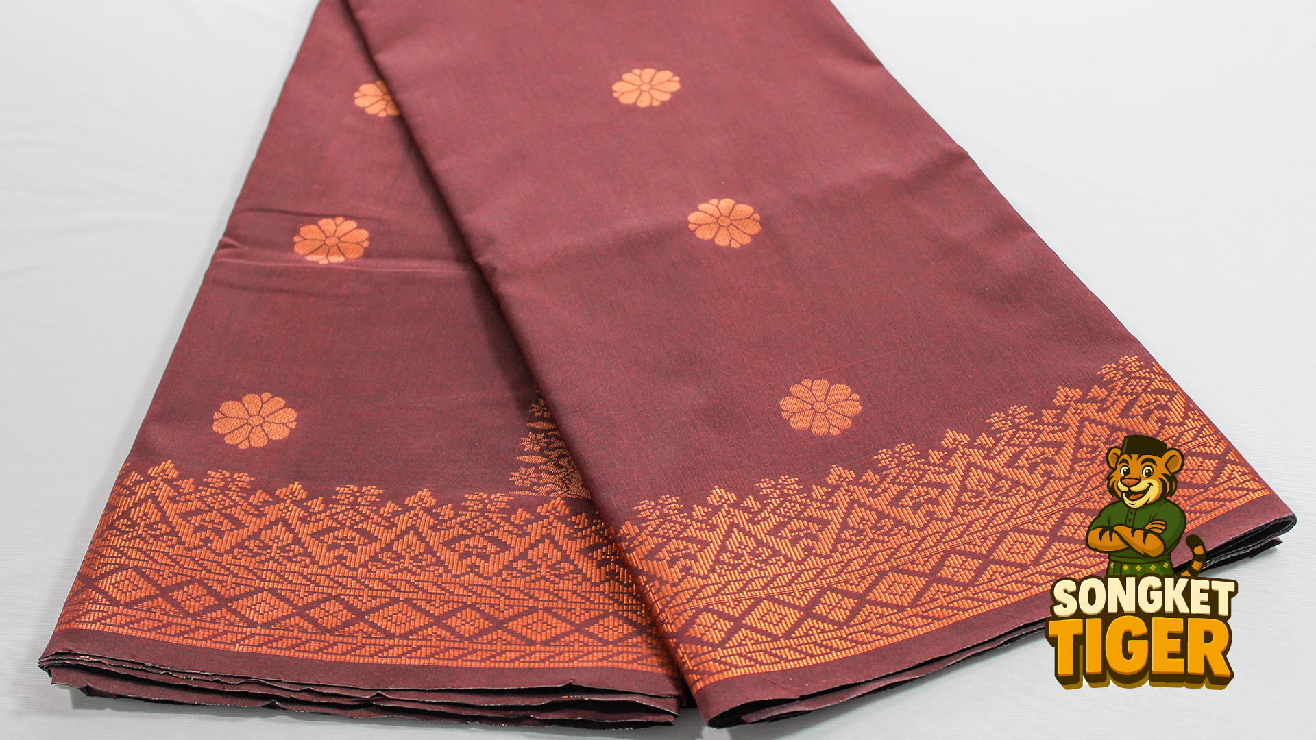 Royal blue songket with silver metallic weave