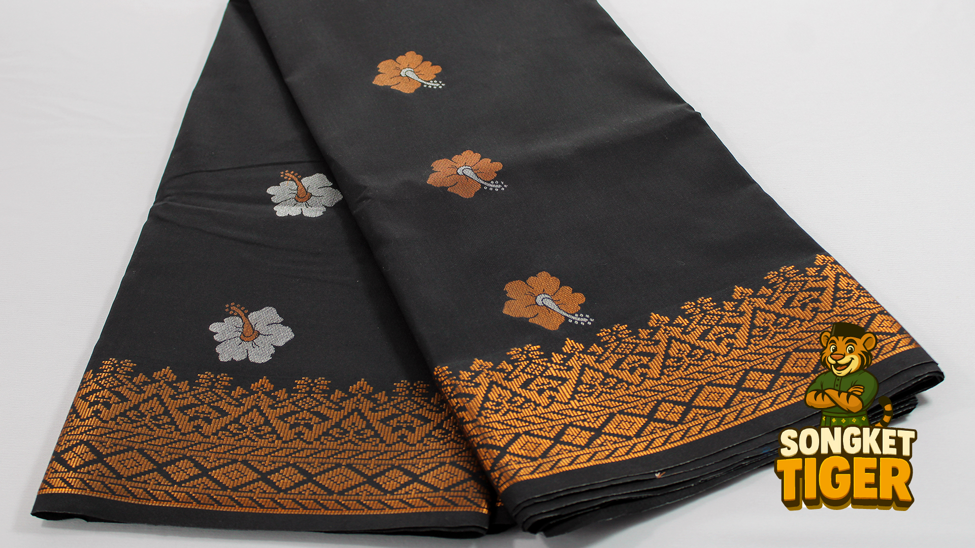 Red songket with ceremonial floral and bird motifs